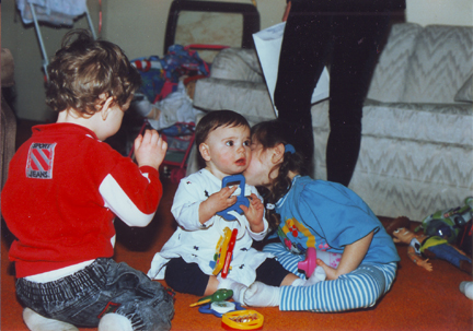 Louis & Allison getting kiss from Sister Lauren