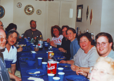 (Starting L-R Clockwise) Uncle Jeff, Alan Gross, Uncle Steve, Aunt Carrie, Howard, Jill, Aunt Daria, Cousin Sarah, Grandma Renee, Cousin Adam & Grandma Marion