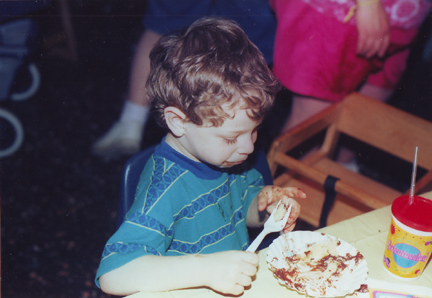 Louis enjoying cake