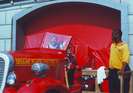 Jill & Louis drives and old Fire Truck