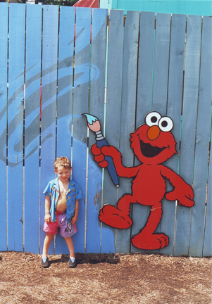 Louis & Elmo on Fence