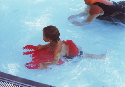 Louis swiming, Jill at right