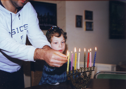 Uncle Steve likes candles while Louis looks on