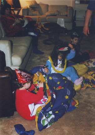 Louis, Abby Elis & David Levy with New Years Hats