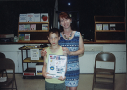 Louis & Mrs. Cullen Showing off Year Book