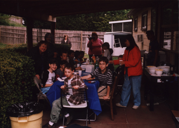 Louis surrounded by friends