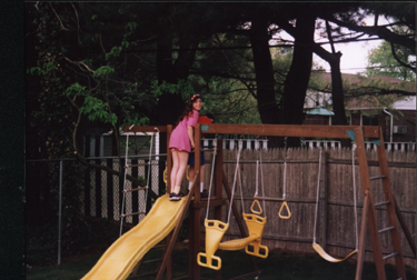 Abby on the sliding pond