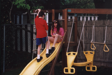 Abby and Louis on the sliding pond