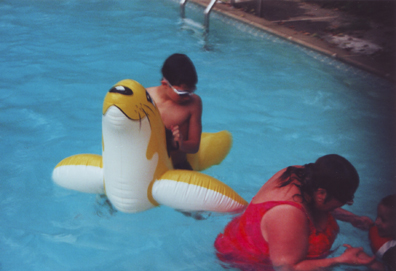 Louis rides the seal, Jill at right