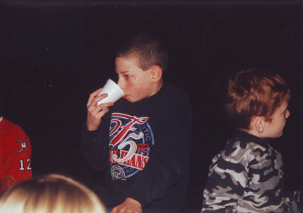 Louis having a drink