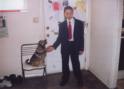 All dressed up in front of main door with foxy