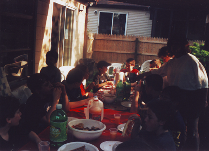 Louis w friends enjoying festive meal.  