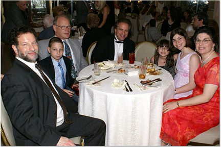 At cocktail hour (L-R) Alan Elis, Louis & Howard Parnes, Allen & Rachel Levy, Abby & Gail Elis