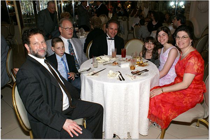 At cocktail hour (L-R) Alan Elis, Louis & Howard Parnes, Allen & Rachel Levy, Abby & Gail Elis