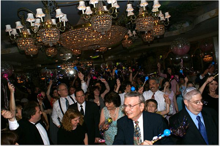 At receiption - Howard  raising hand behind Rich Skibins (far back left)